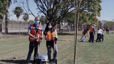 A group of people wearing face masks